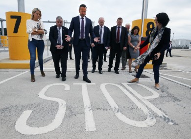 Taoiseach Leo Varadkar and European Affairs Minister Helen McEntee with port and customs officials during a visit to new physical infrastructure at Dublin Port.
