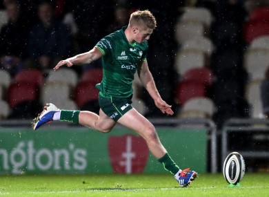 Conor Fitzgerald kicking a conversion.