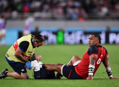 Billy Vunipola receiving medical attention during England's game against Argentina at Tokyo Stadium.