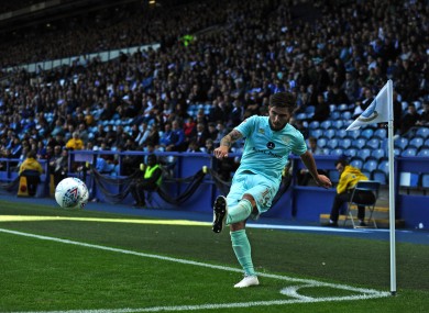 Ryan Manning takes a corner for QPR.