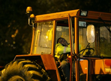 Farmers sleep in the cabs of their tractors outside the Shelbourne hotel.