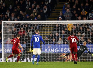 Pay the penalty: Milner tucked away the spot kick to put Liverpool 2-0 up.