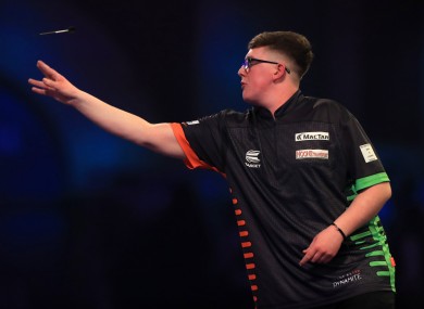 Keane Barry in his match with Vincent van der Voort during day four of the William Hill World Championships at Alexandra Palace, London.