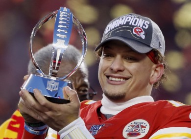 Patrick Mahomes with the Lamar Hunt Trophy after the Chiefs' AFC Championship win.