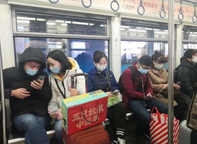 Chinese citizens in Chongqing, China wearing face masks.