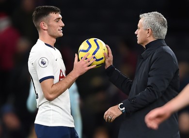 Troy Parrott is handed the match ball by Jose Mourinho at the end of his only senior appearance under the new manager.