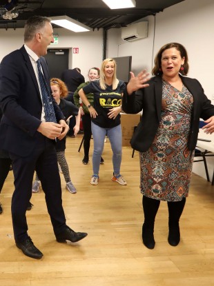 Sinn Fein leader Mary Lou McDonald and TD Chris Andrews doing the Macarena with children during an event in the Ringsend Irishtown Community Centre in Dublin.