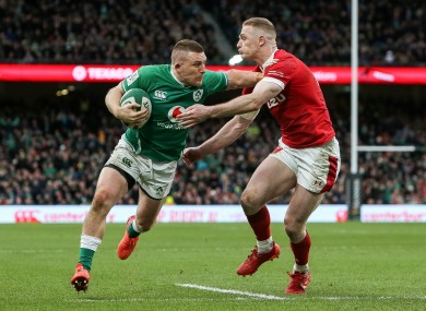 Conway gets beyond Johnny McNicholl to score Ireland's bonus point try.