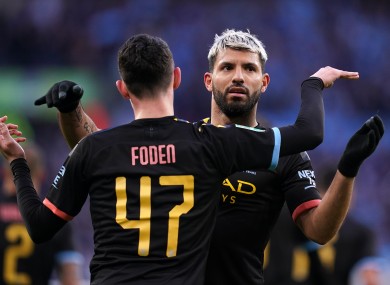 Manchester City's Sergio Aguero (right) celebrates scoring his side's first goal of the game.