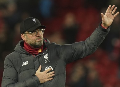 Jurgen Klopp applauds the Anfield crowd after the game.