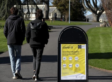 A sign with guidelines on social distancing when outdoors in the Botanic Gardens in Dublin