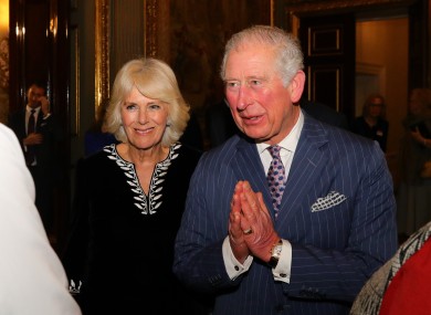 The Prince of Wales and the Duchess of Cornwall greeting guests during the Commonwealth Reception at Marlborough House, London earlier this month.