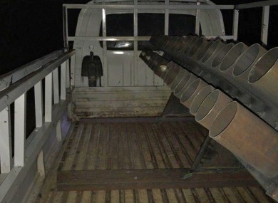 This photo released by the government-affiliated Media Security Cell shows a rocket-rigged truck launcher after a rocket attack on Camp Taji, a few miles north of Baghdad, in Rashidiya, Iraq.