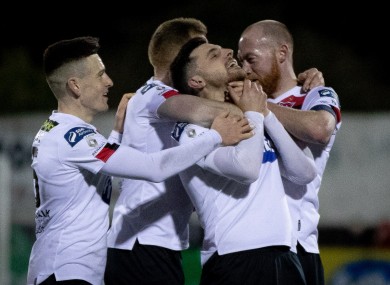 The Dundalk players celebrate a goal from Jordan Flores.