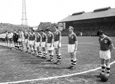 The Ireland team observe a minute's silence.