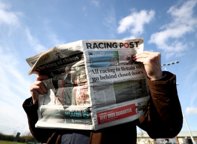 The Racing Post is read at a meeting of Southwell Races last week.