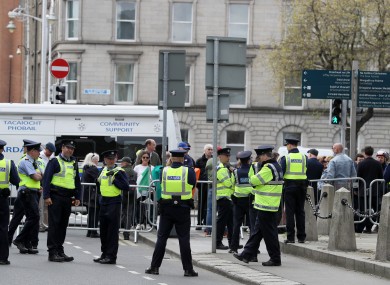 Members of gardaí and supporters of Gemma O'Doherty and John Waters.