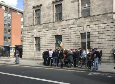 A crowd gathered outside the Fourt Courts today for the hearing.