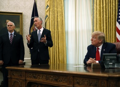 Daniel O'Day, CEO of Gillead Sciences Inc., speaks during a meeting with President Donald Trump in the Oval Office of the White House, Friday,