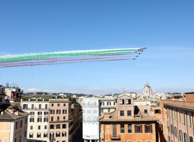 The Italian Frecce Tricolori (Tricolor Arrows) aerobatics team fly over Rome for Republic Day in Italy yesterday