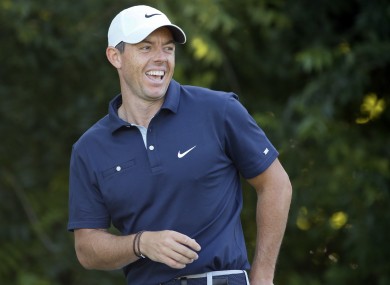 Rory McIlroy reacts after playing a shot from the sixth tee during a practice round for the Charles Schwab Challenge golf tournament.