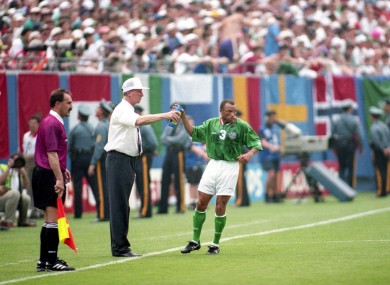Ireland manager Jack Charlton gives water to Terry Phelan during the 1994 World Cup in the match against Italy.