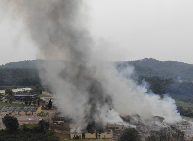 Smoke billows from a fire following an explosion at a fireworks factory outside the town of Hendek, Sakarya province, today.