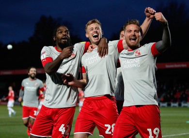 Eoin Doyle (centre) scored 26 goals in 28 appearances to help Swindon Town win the League Two title.