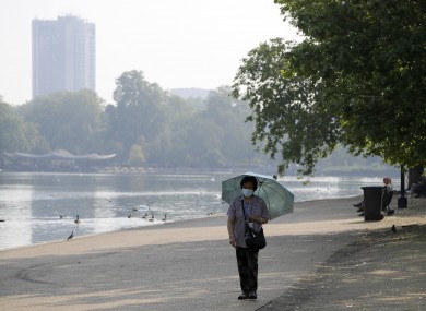 Woman wearing a mask in London's Hyde Park.