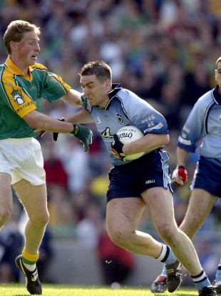 Trevor Giles tackles Johnny Magee during the 2002 Leinster semi-final.
