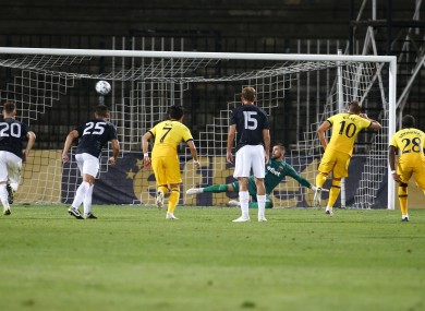 Tottenham's Harry Kane, centre right, scores a penalty.