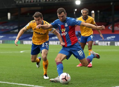Seamus Coleman battles for possession with James McArthur.