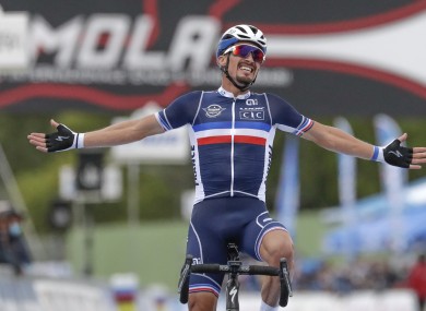 France's Julian Alaphilippe celebrates after winning the men's elite event.