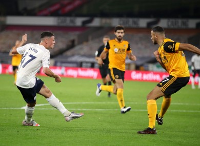 Manchester City's Phil Foden scores his goal during the game.