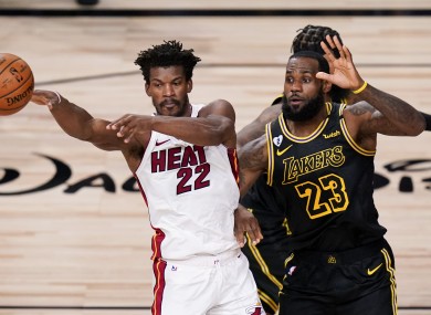 Jimmy Butler under pressure from LeBron James.