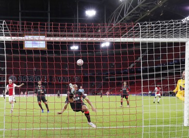 Fabinho clears the ball off the line for Liverpool.