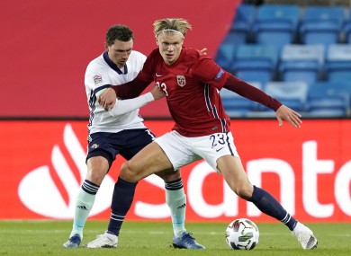 Norway's Erling Haaland under pressure from Northern Ireland's Corry Evans.