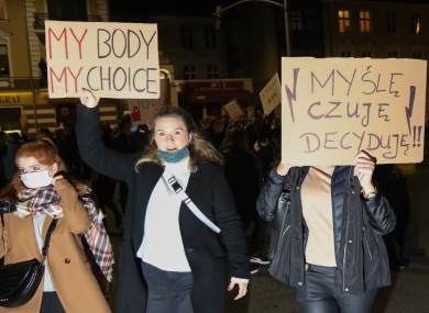 Protesters with pro-choice and anti-government slogans marching yesterday in Gdansk, Poland.