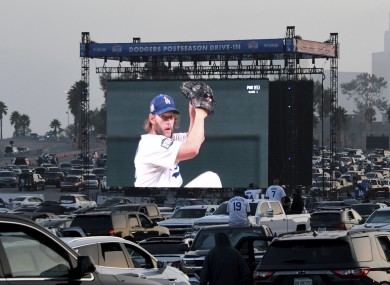 Fans at Dodger Stadium watch Clayton Kershaw pitch during Game One of the World Series.
