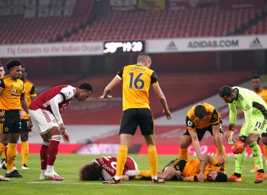 Luiz and Jimenez lay stricken on the turf following their collision.