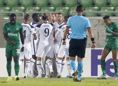 Tottenham's Harry Kane celebrates after scoring his side's first goal.