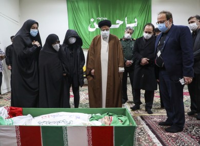 Ian's Judiciary Chief Ayatollah Ebrahim Raisi pays his respect to the body of slain scientist Mohsen Fakhrizadeh