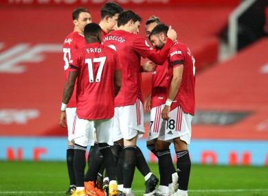 Manchester United's Bruno Fernandes (right) celebrates scoring.