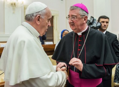 File image of Pope Francis with Archbishop of Dublin Diarmuid Martin who is retiring today.