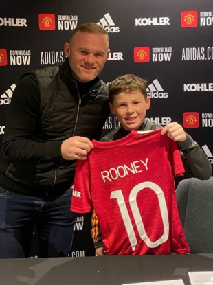 Chip off the old block: Wayne Rooney with his son Kai.