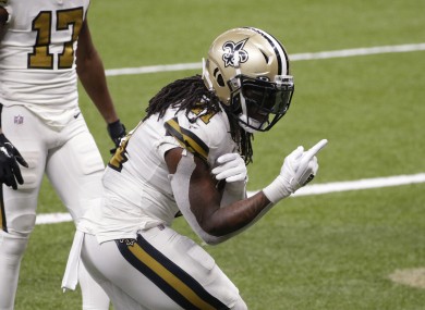 Alvin Kamara celebrates his fifth of six touchdowns against the Vikings.