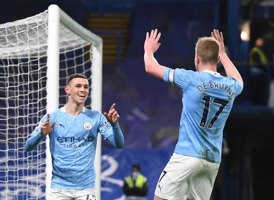 Phil Foden celebrates after scoring at Stamford Bridge.