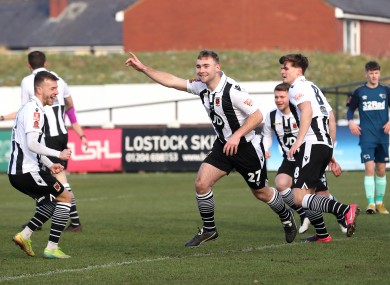 Chorley.'s Connor Hall (centre) celebrates scoring his side's first goal