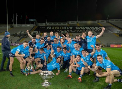The Dublin team celebrate with the Sam Maguire after completing the six-in-a-row.