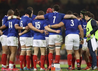 The France team in a huddle prior to last year's Six Nations fixture against Wales.